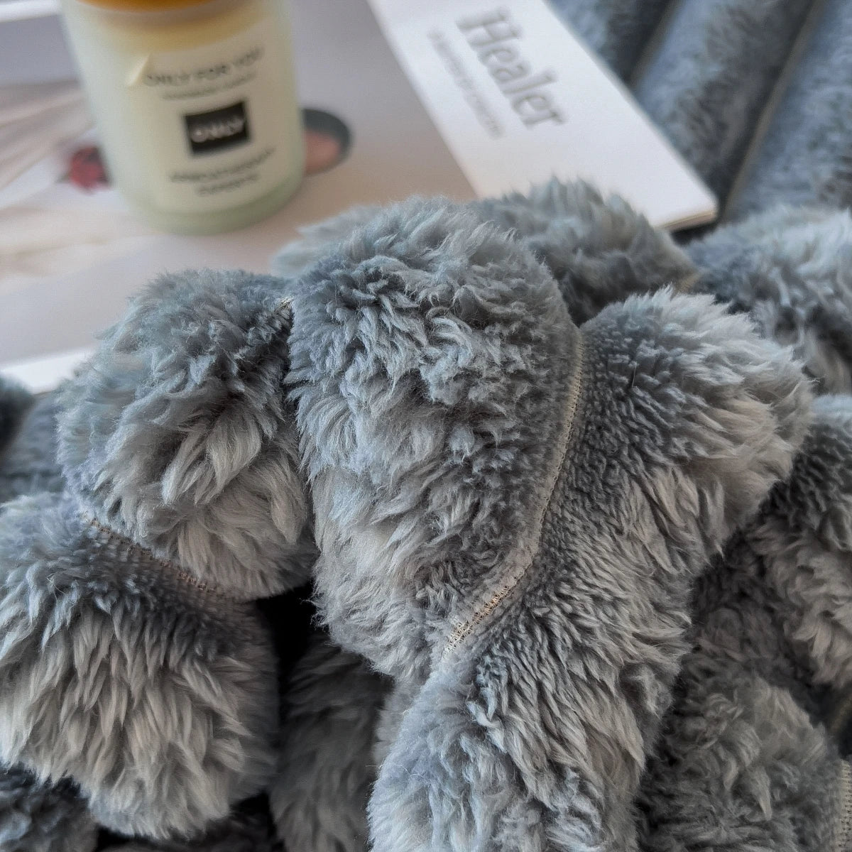 Solid color striped multifunctional AC blanket — for bed, nap, or pet use.